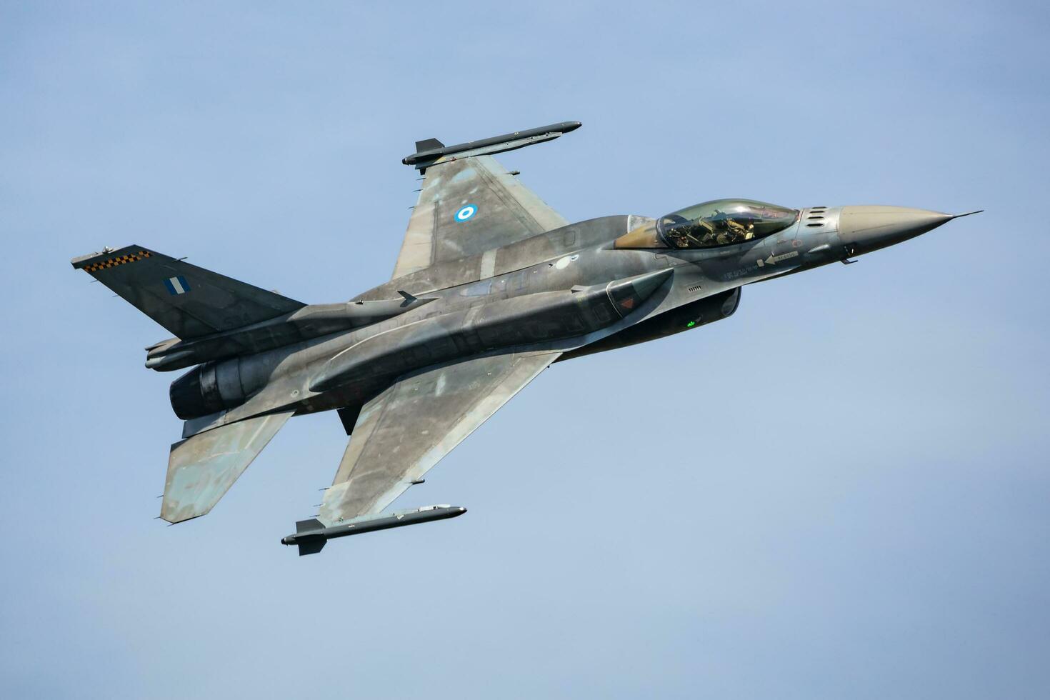 Hellenic Air Force Lockheed Martin F-16 Fighting Falcon. Military fighter jet plane at air base. Aviation and aircraft. Air defense. Fly and flying. photo