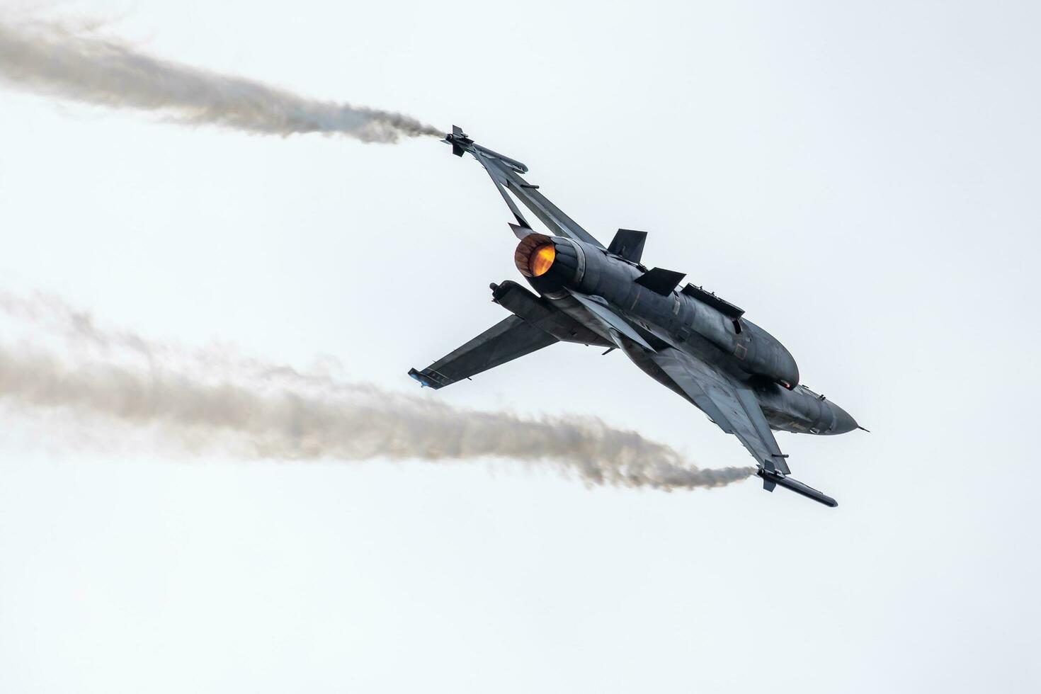 Military fighter jet plane at air base. Airport and airfield. Air force flight operation. Aviation and aircraft. Air defense. Military industry. Fly and flying. photo