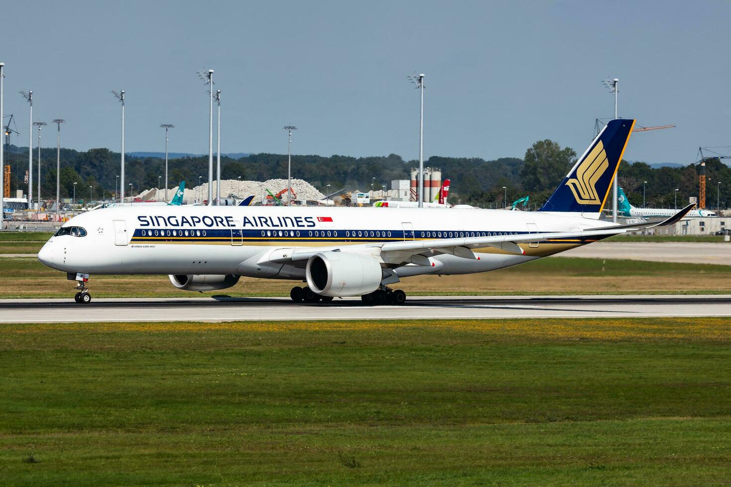 Singapore Airlines passenger plane at airport. Schedule flight travel. Aviation and aircraft. Air transport. Global international transportation. Fly and flying. photo