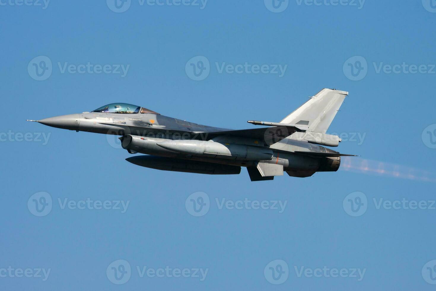 Military fighter jet plane at air base. Airport and airfield. Air force flight operation. Aviation and aircraft. Air defense. Military industry. Fly and flying. photo