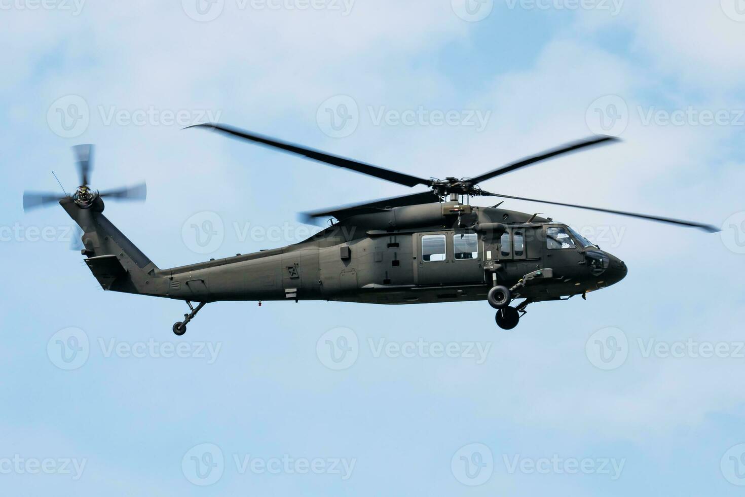 Untitled military helicopter at air base. Air force and army flight transportation. Aviation and rotorcraft. Transport and airlift. Military industry. Fly and flying. photo