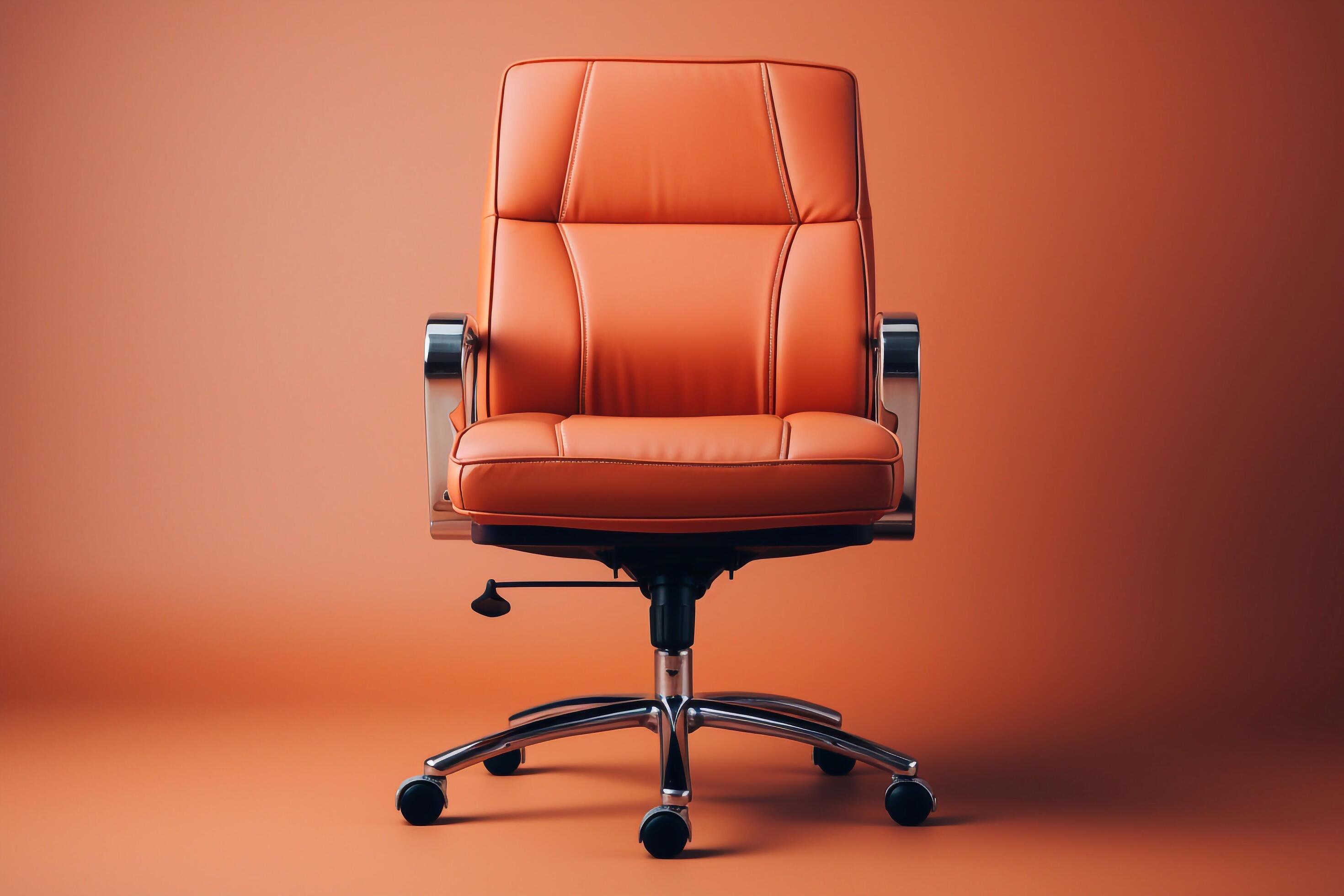 Front view of Genuine Leather office chair isolated on red