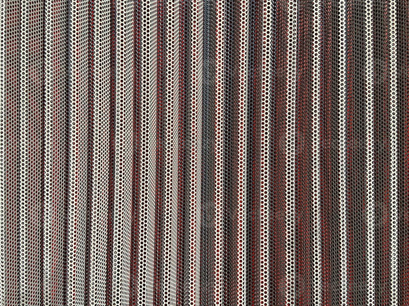 a close up of a wall with a striped pattern photo