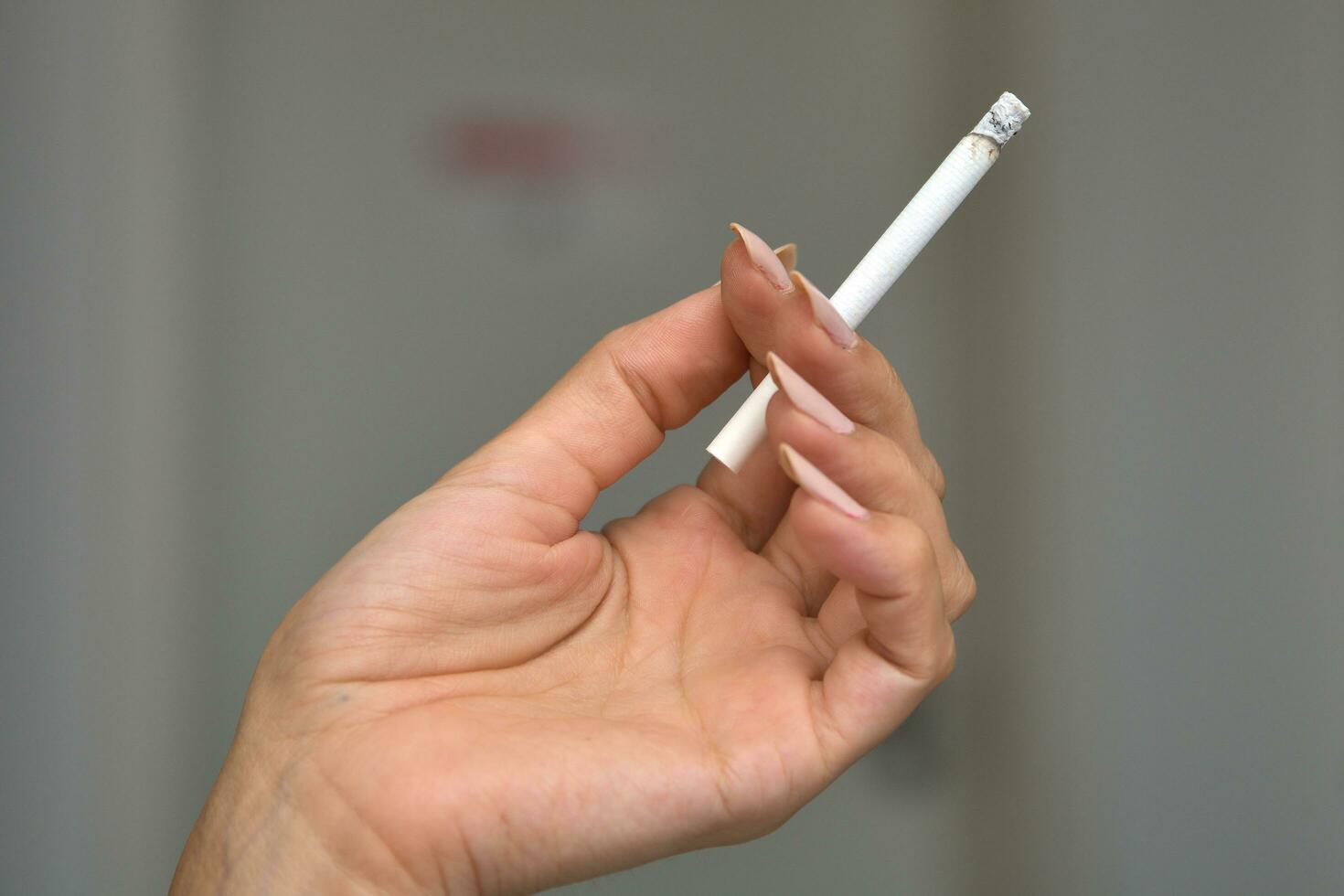 Macro photography of cigarette with blurred background photo