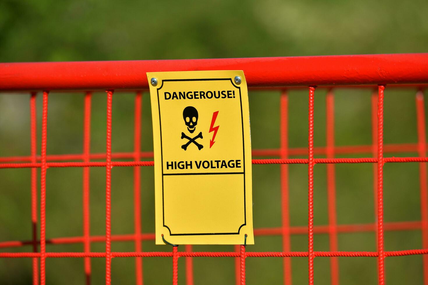 Photography of high voltage sign photo