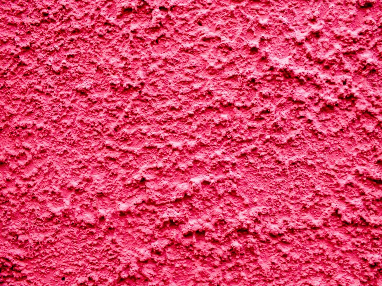 red wall with a rough surface photo