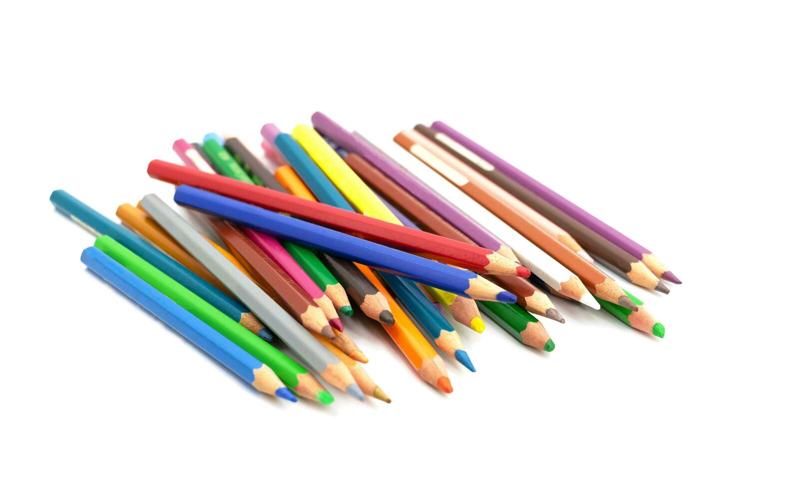 set of colored wood pencils on white photo