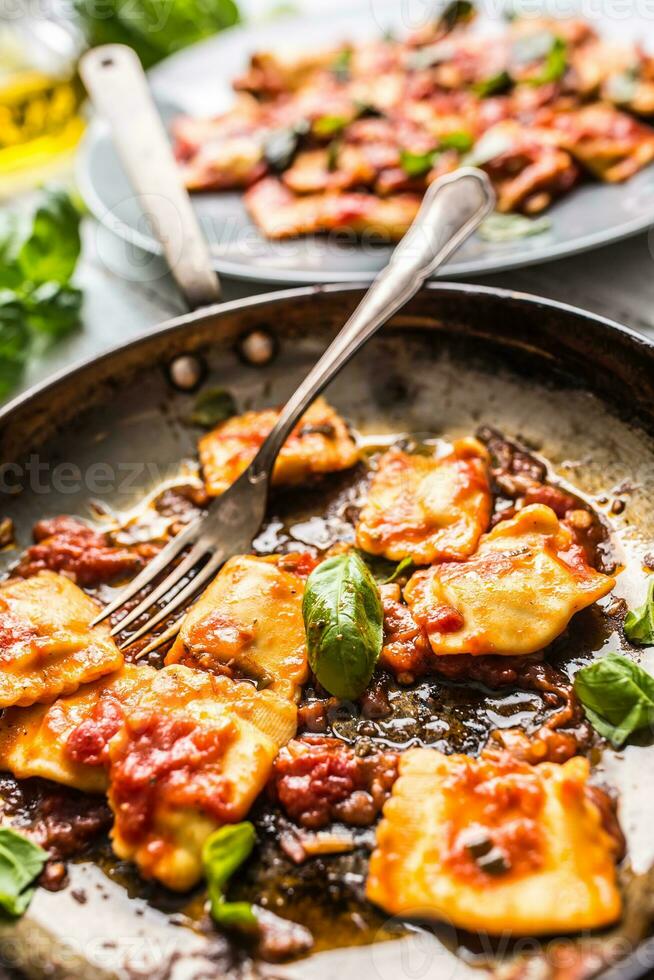 Italian or mediterranean food pasta ravioli of tomato sauce. photo