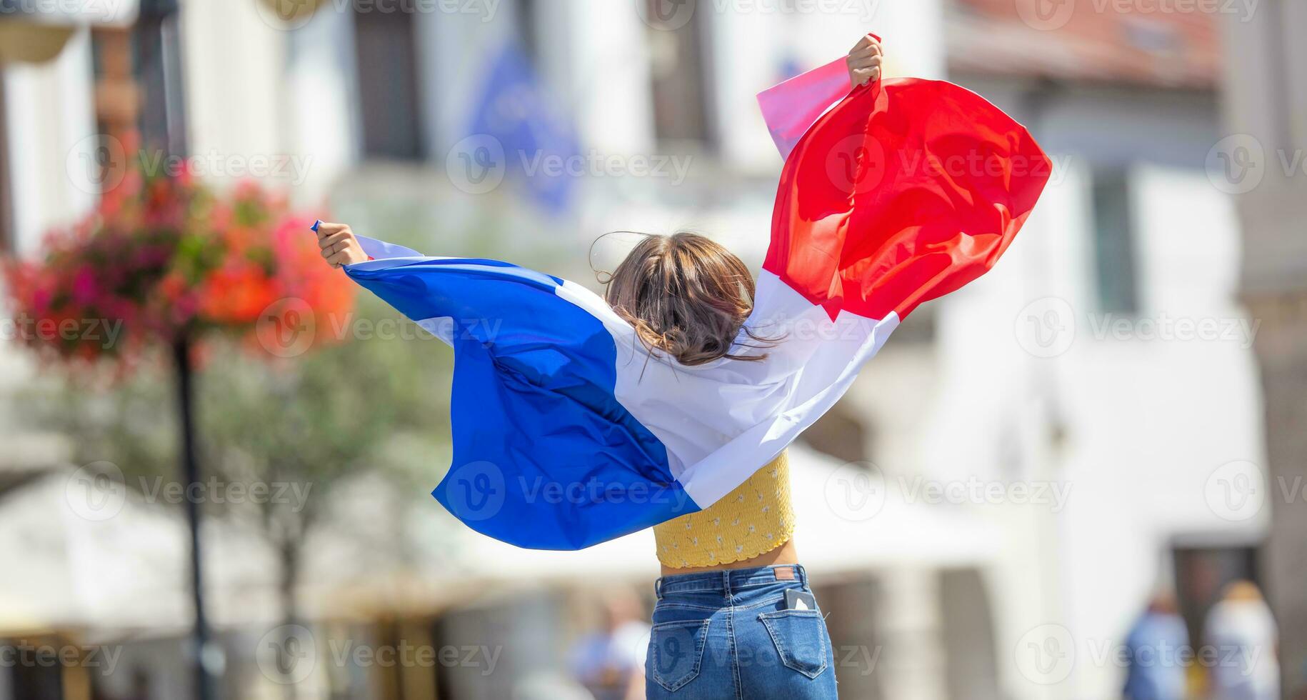 Attractive happy young girl with the Belgian flag photo