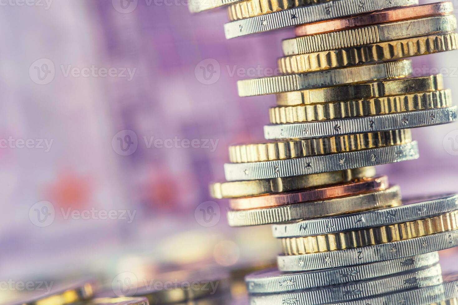 Euro Coins stacked on each other in different positions. Money concept. photo