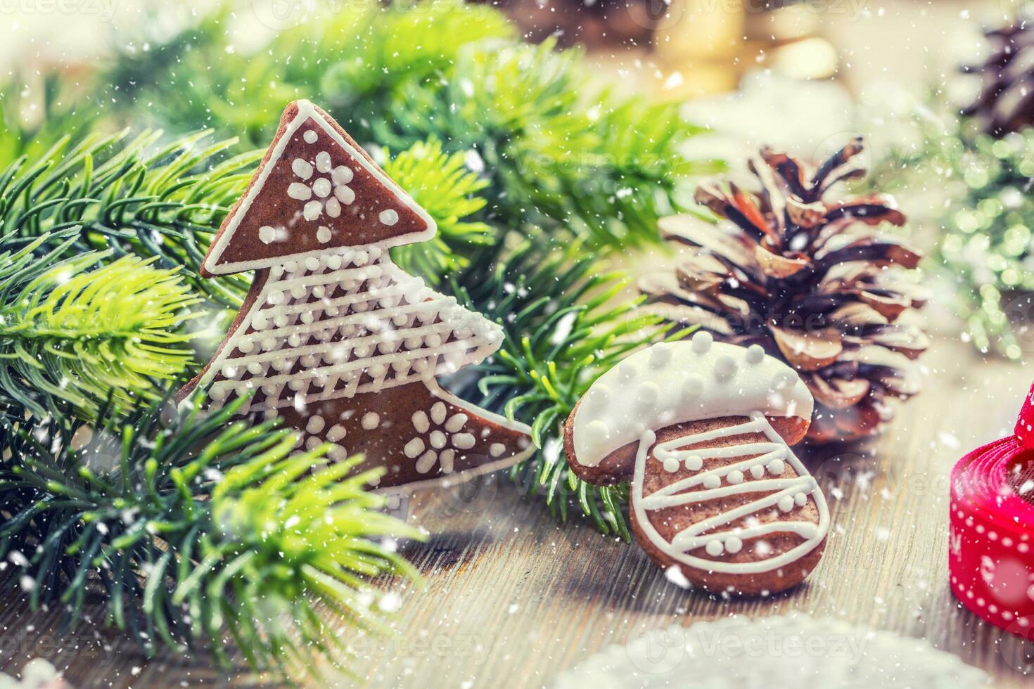 Christmas. Christmas ball pastry gingerbread pine cone and decoration in snowy atmosphere photo