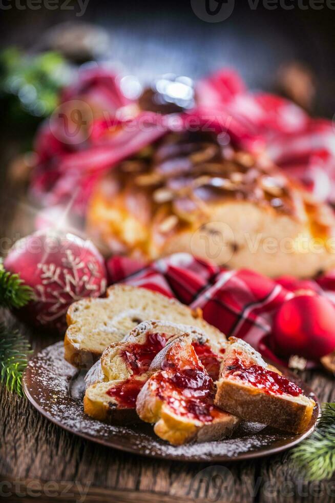 Christmas Cake and Christmas Decorations. Christmas cake, slovak or eastern europe traditional pastry - vianocka photo