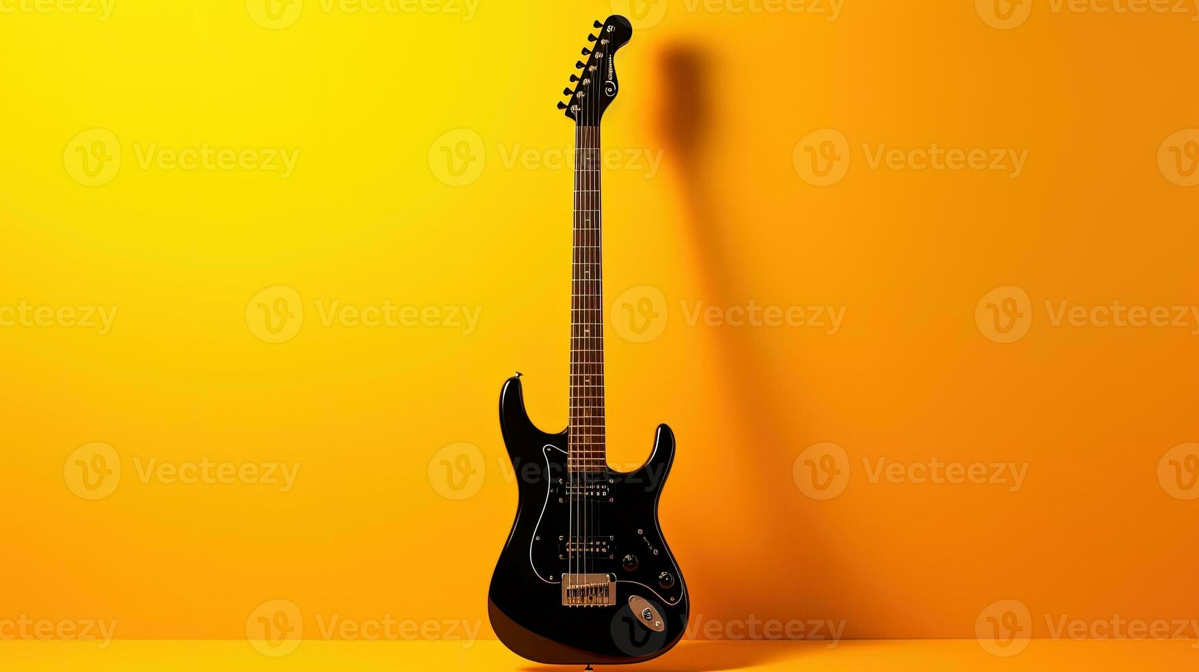 Horizontal electric guitar silhouette on a yellow background photo