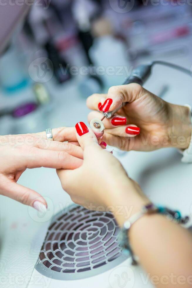 Nail Care and manicure. Nail care and the techniques of gel nail application photo