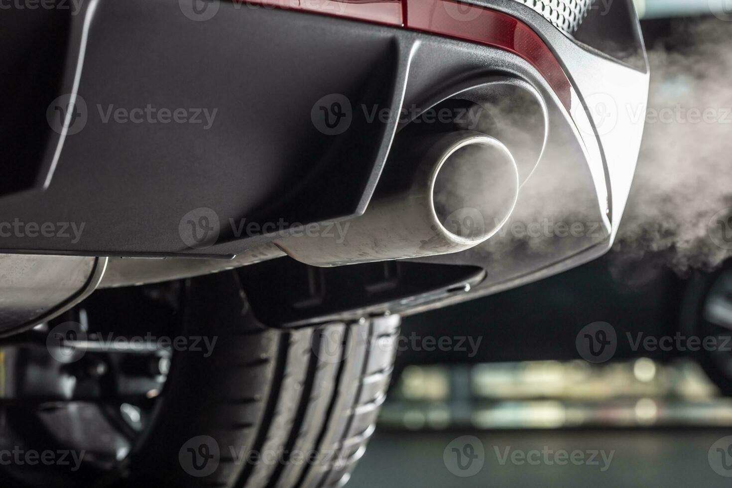 Leaking gases from the exhaust of a petrol or diesel car photo