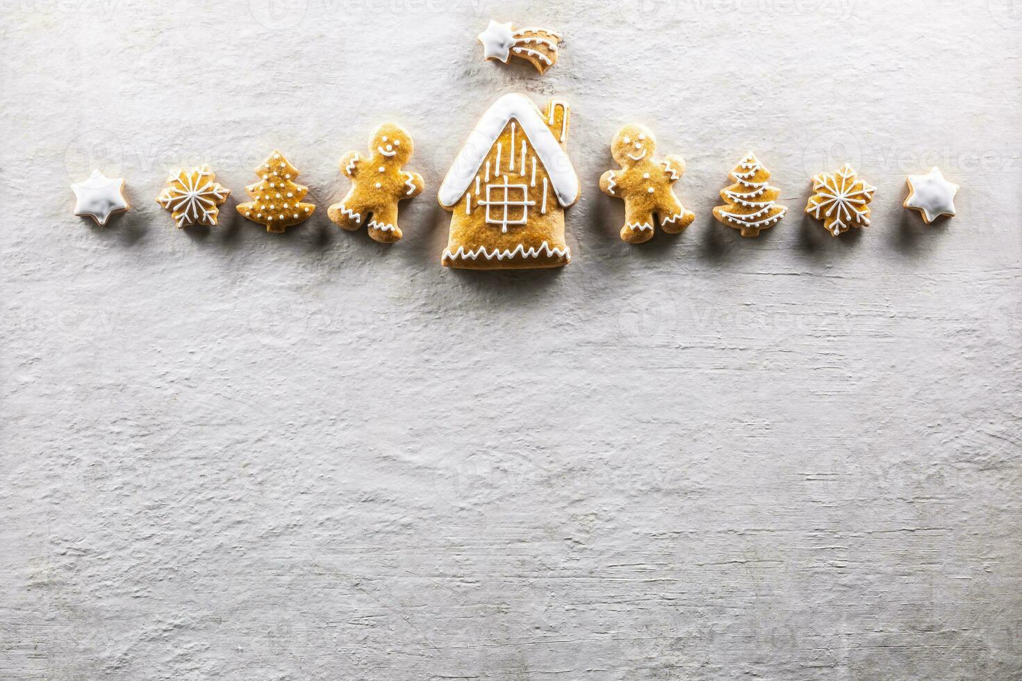 Christmas gingerbread cookies, house, man, tree and snowflakes - copy space photo
