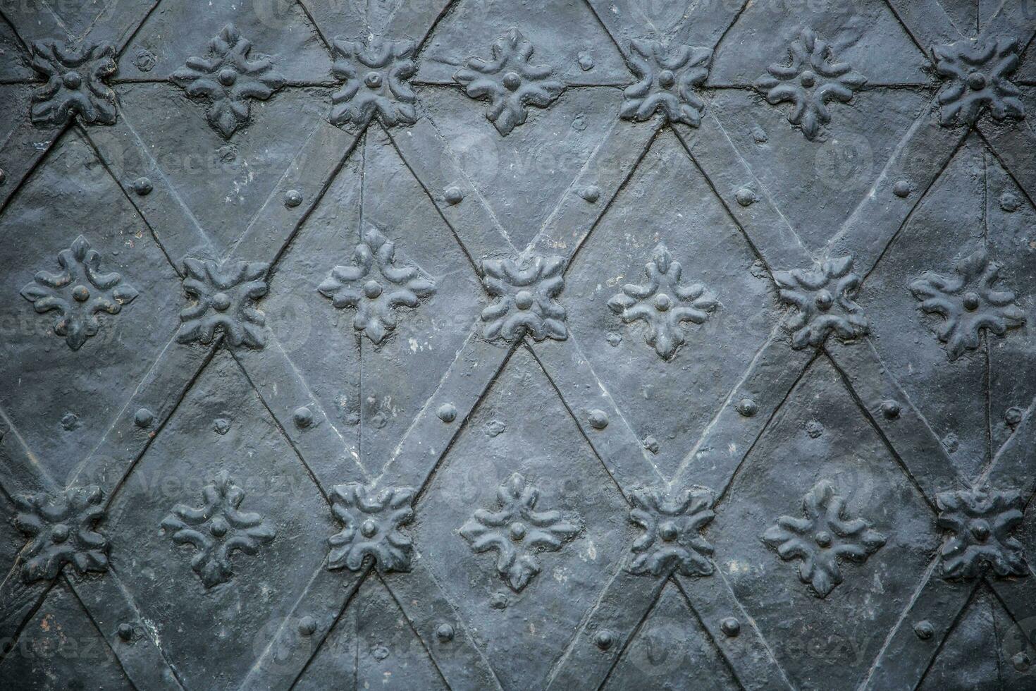 Rustic ancient doors pattern medieval repetitive ornaments photo