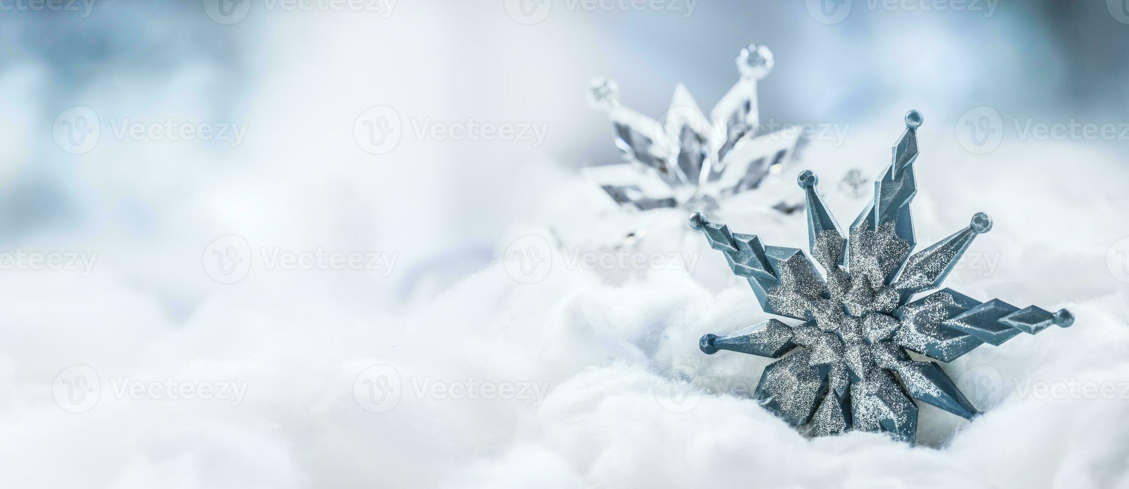 Blue christmas star on snow. Merry Xmas concept photo