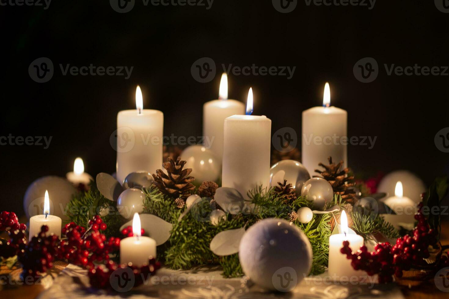 Advent wreath with burning candles christmas balls and decorations photo