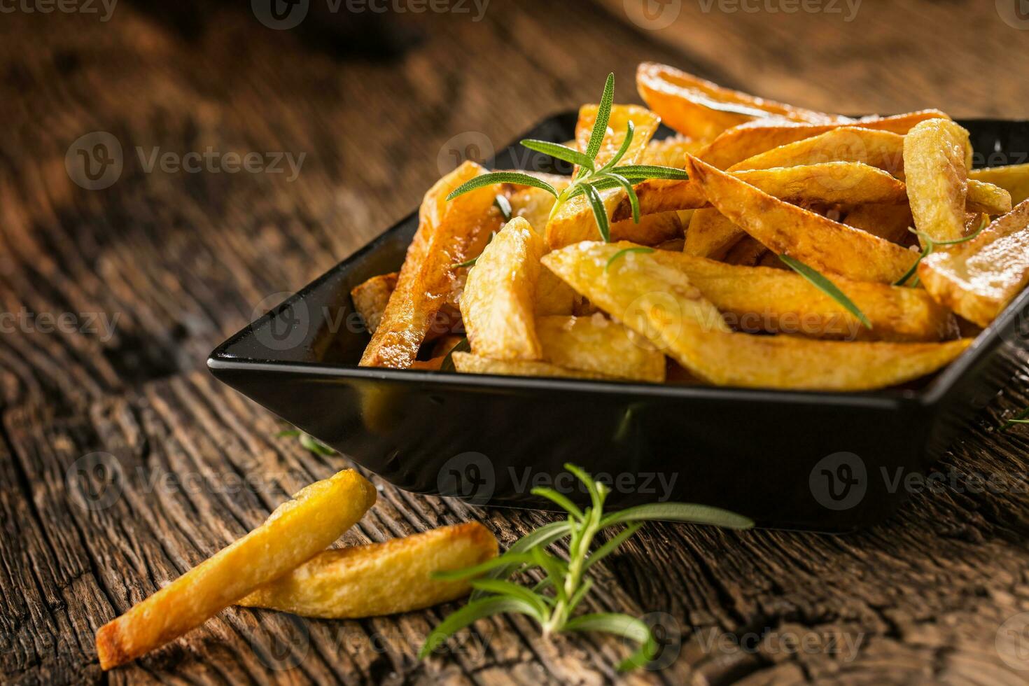 Potato Fries. Homemade potato fries with salt and rosemary photo