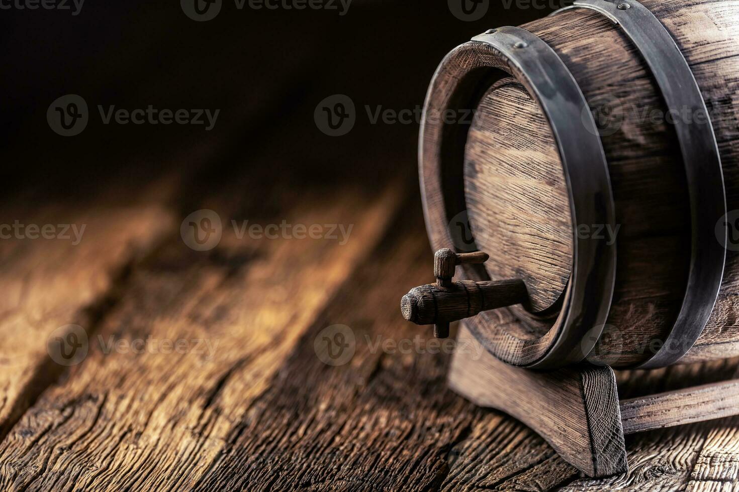 Wooden barrel with wiskey, wine, cognac, rum or beer photo