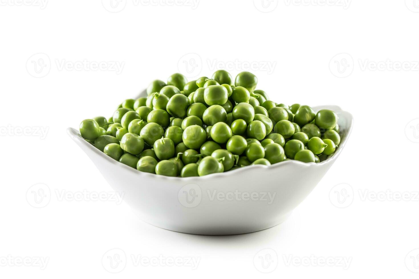 Fresh Green peas in white bowl isolated on white background photo