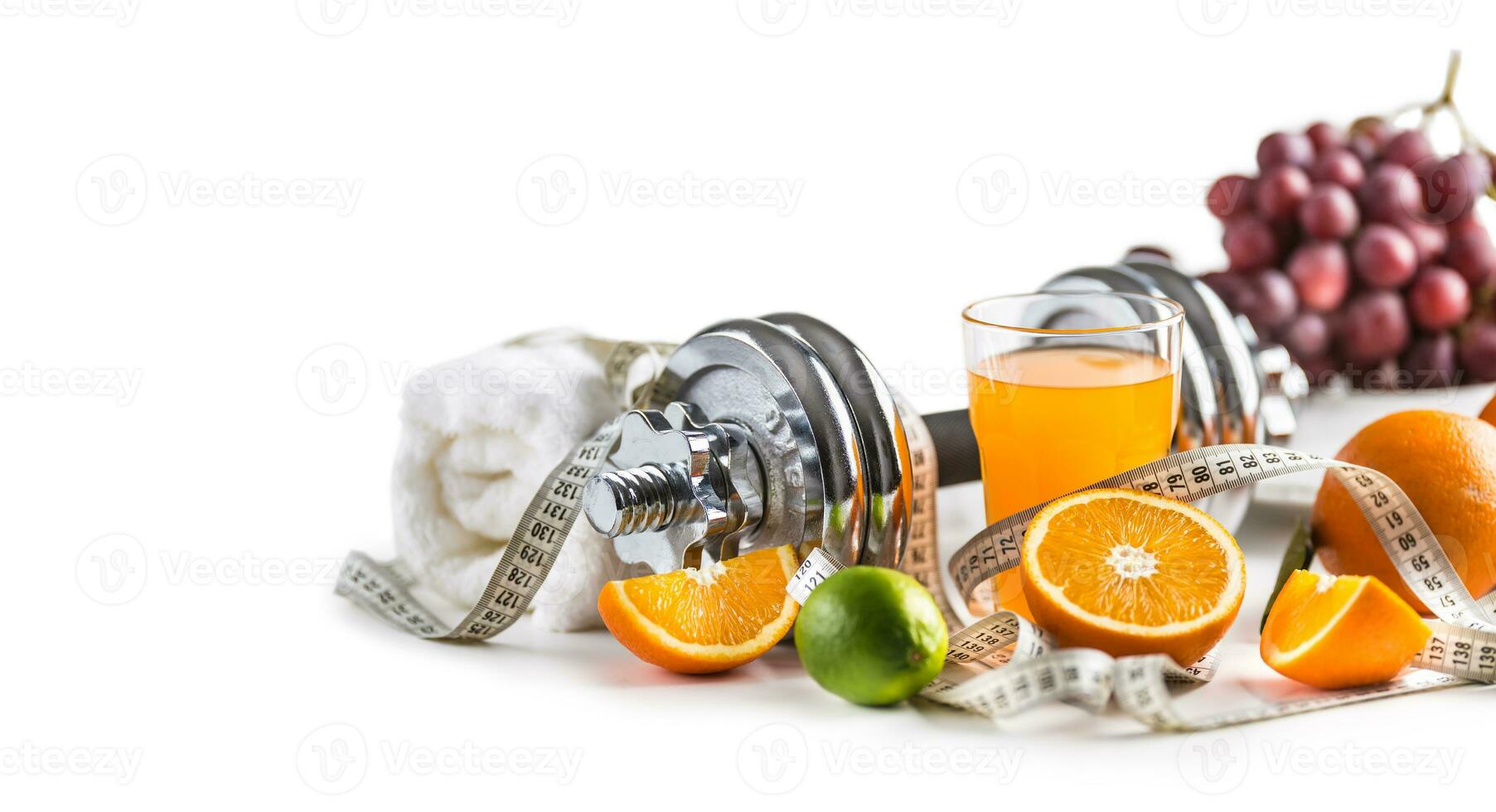 Sport dumbbells fresh fruit measure tape and multivitamin juice isolated on white background. Healthy sport and diet concept. photo