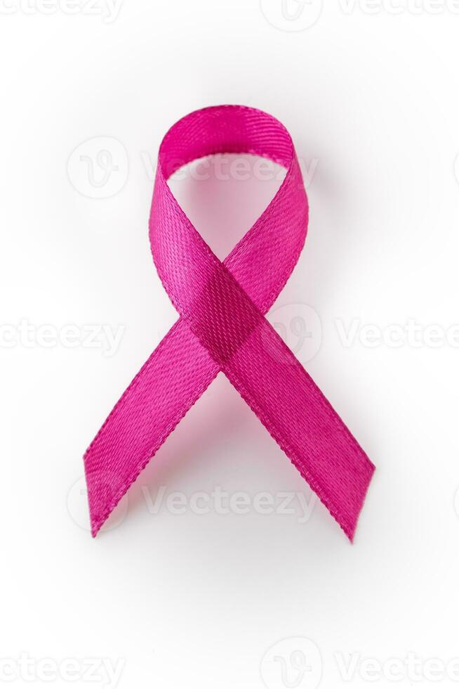 Breast cancer symbol pink ribbon isolated on white photo