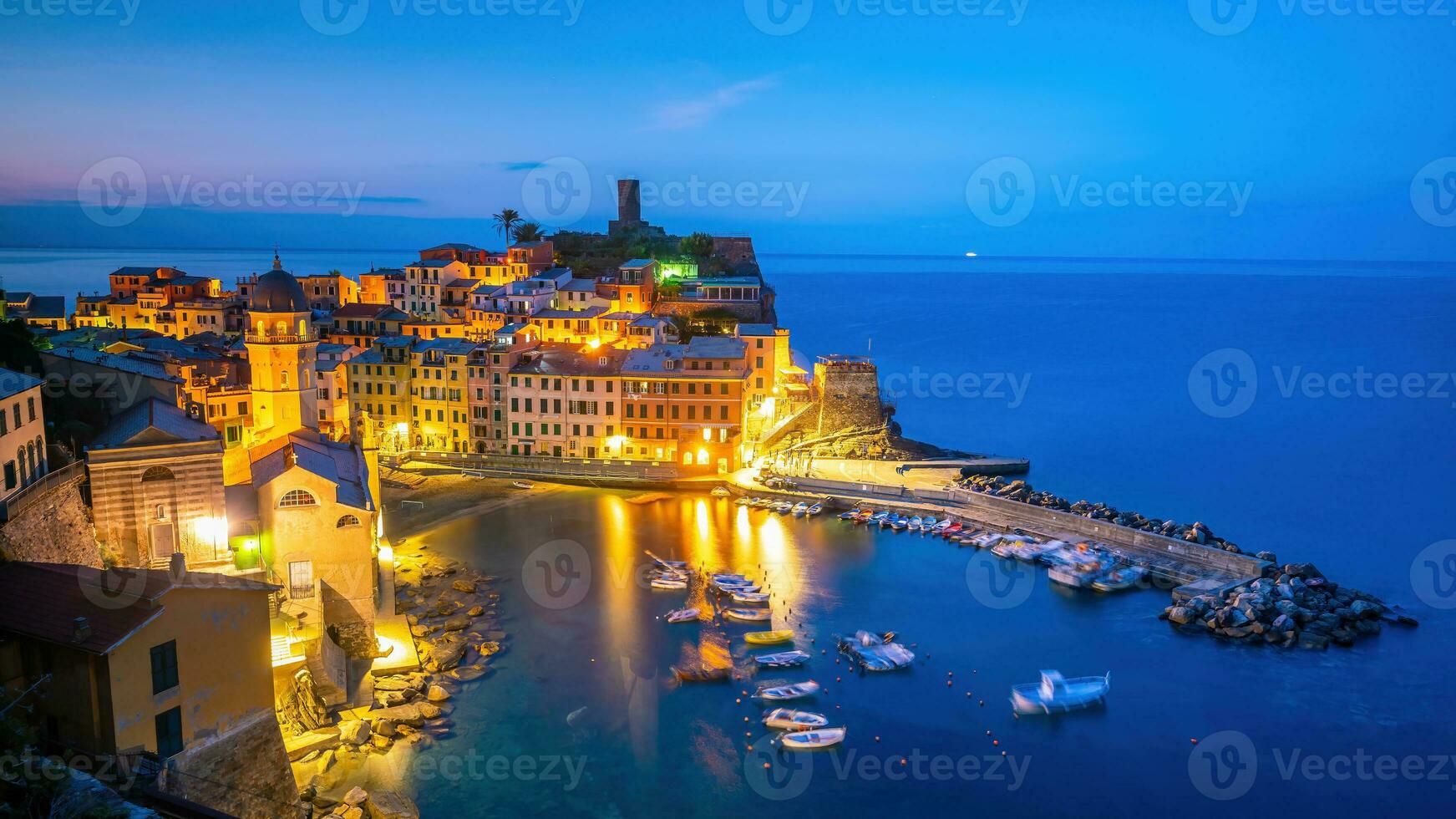 Colorful cityscape of buildings over Mediterranean sea, Europe, Cinque Terre in Italy photo