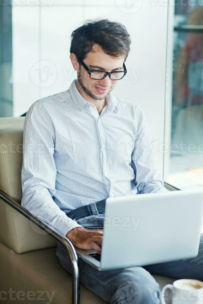 Man working from a cade photo