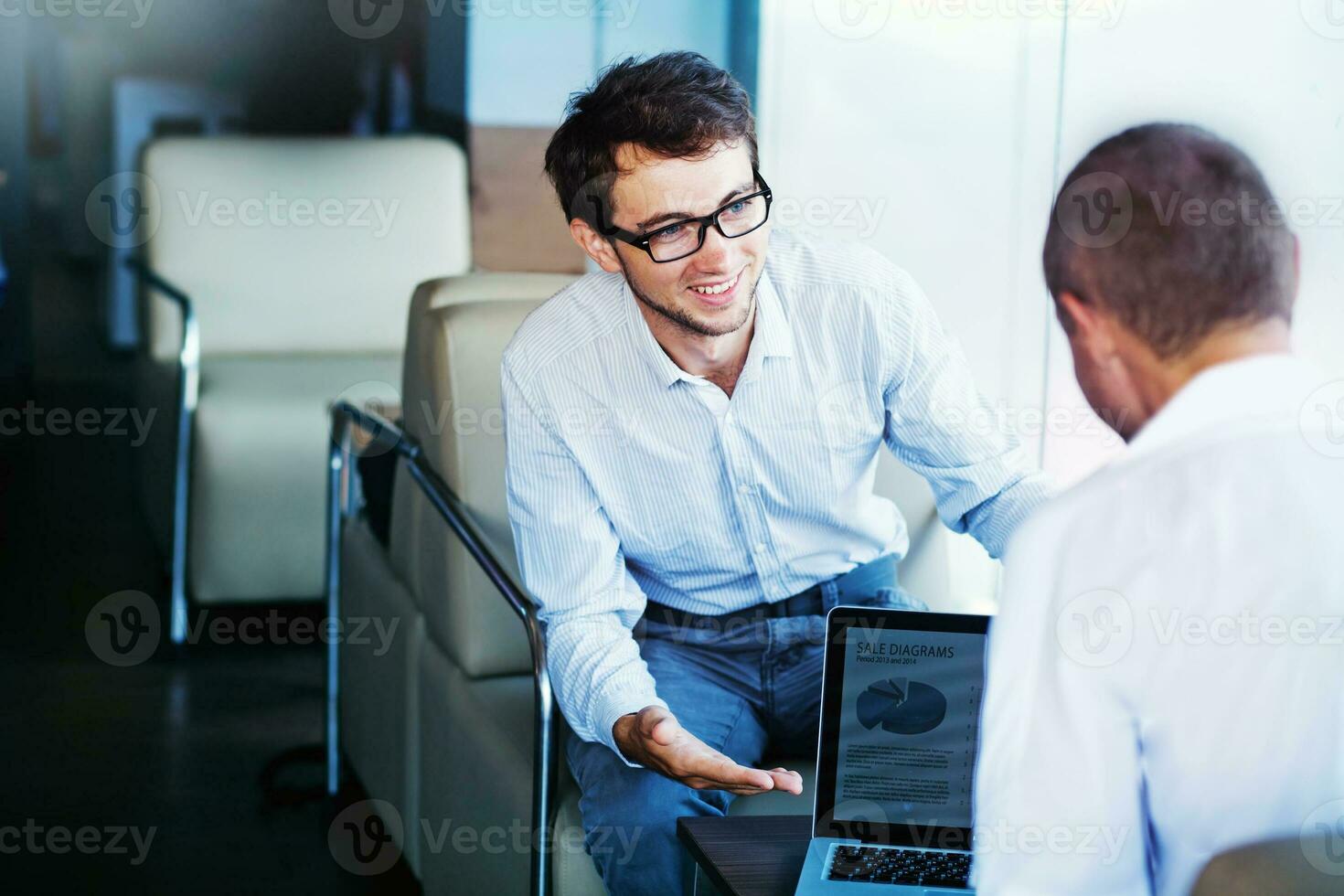 Man working from a cade photo