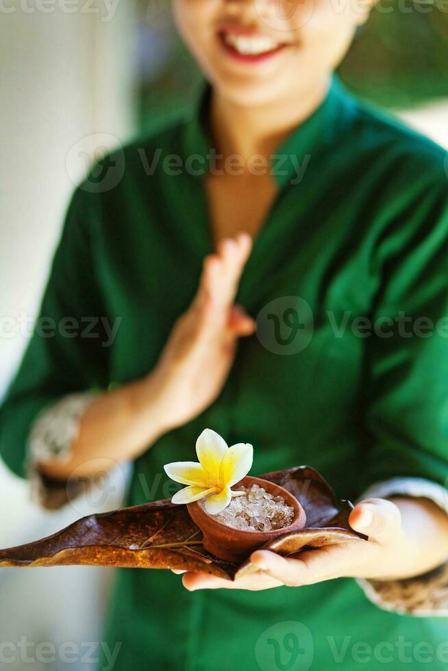 Asian woman serving local food photo