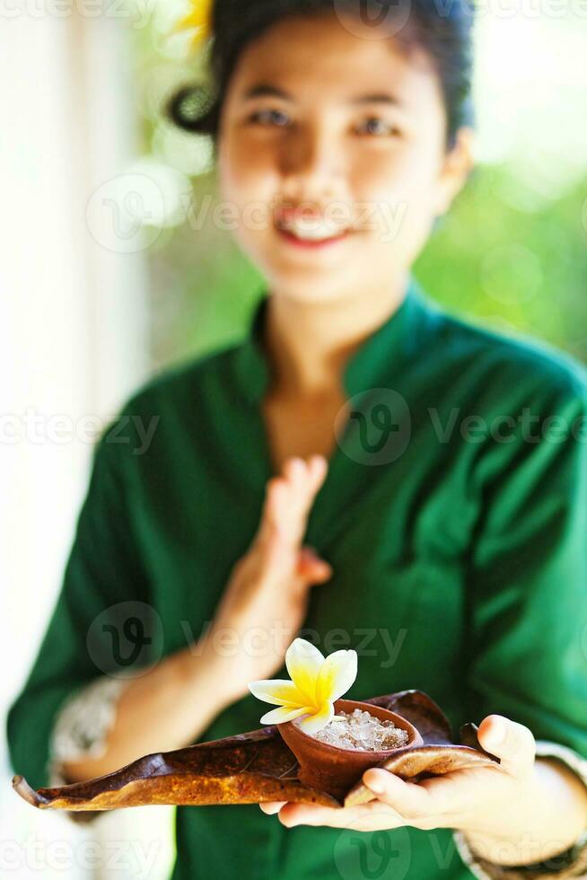 Asian woman serving local food photo