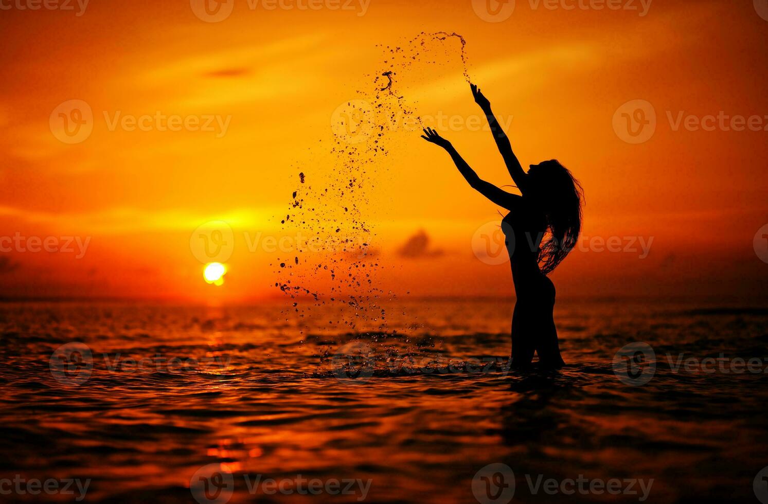 Woman on the beach during sunset time photo