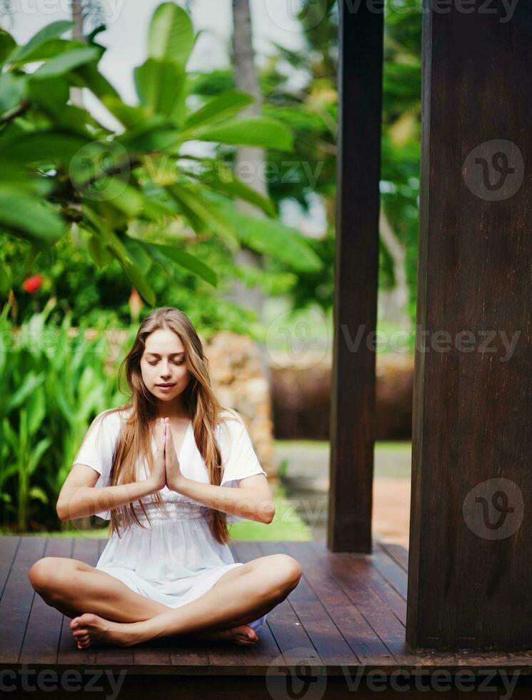 Woman on a wooden floor photo