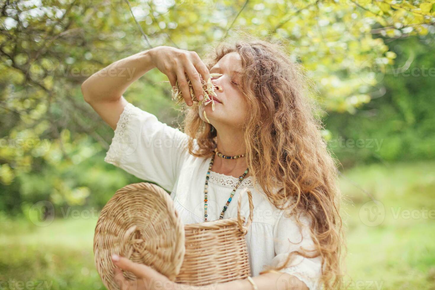 a woman with long hair and a basket photo