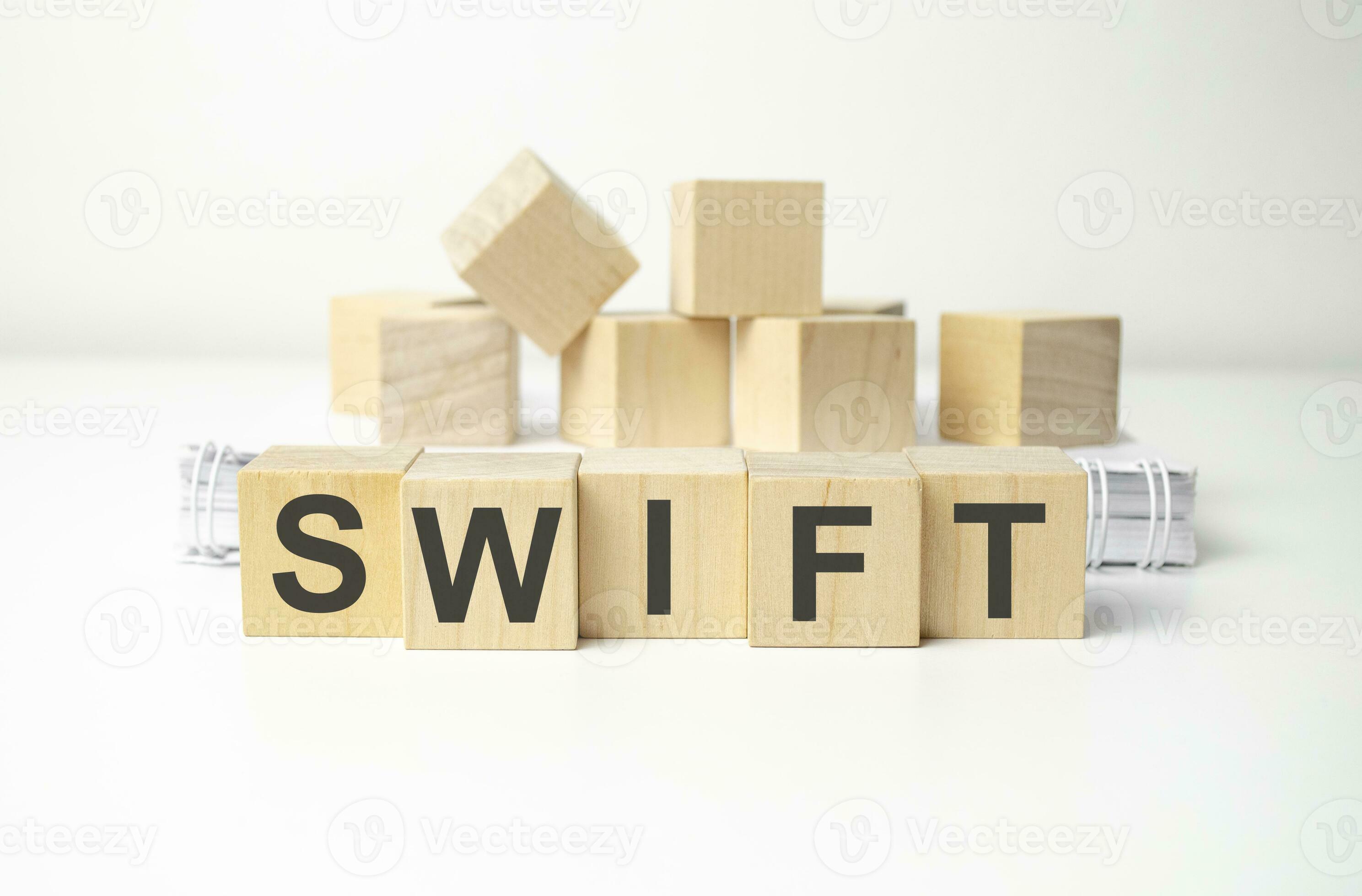 wooden cube block with swift business word on table background. 27613086  Stock Photo at Vecteezy