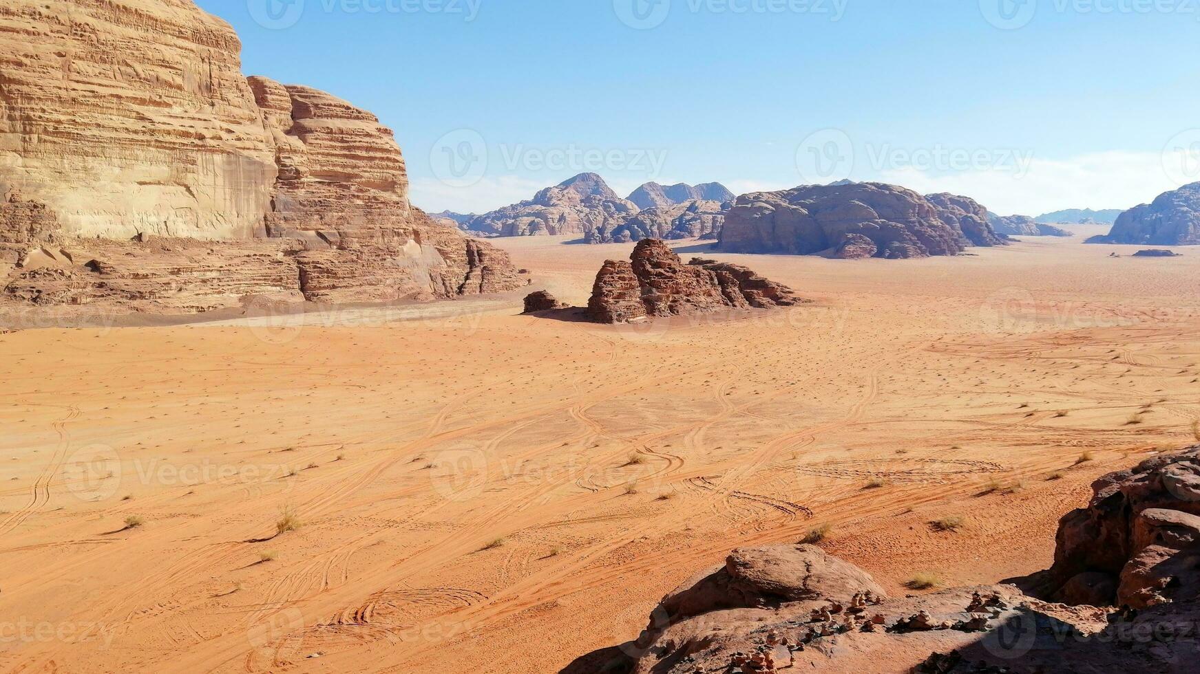 With camel caravan through the deserts of Wadi Rum, Jordan photo