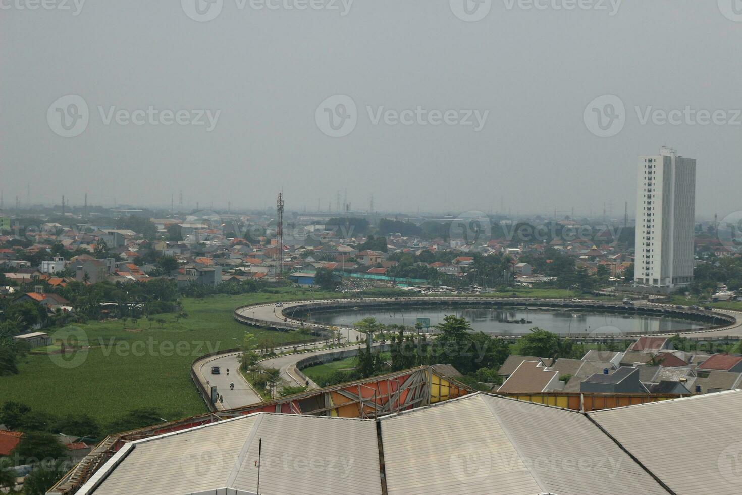View of tall buildings, seen from the rooftop. photo