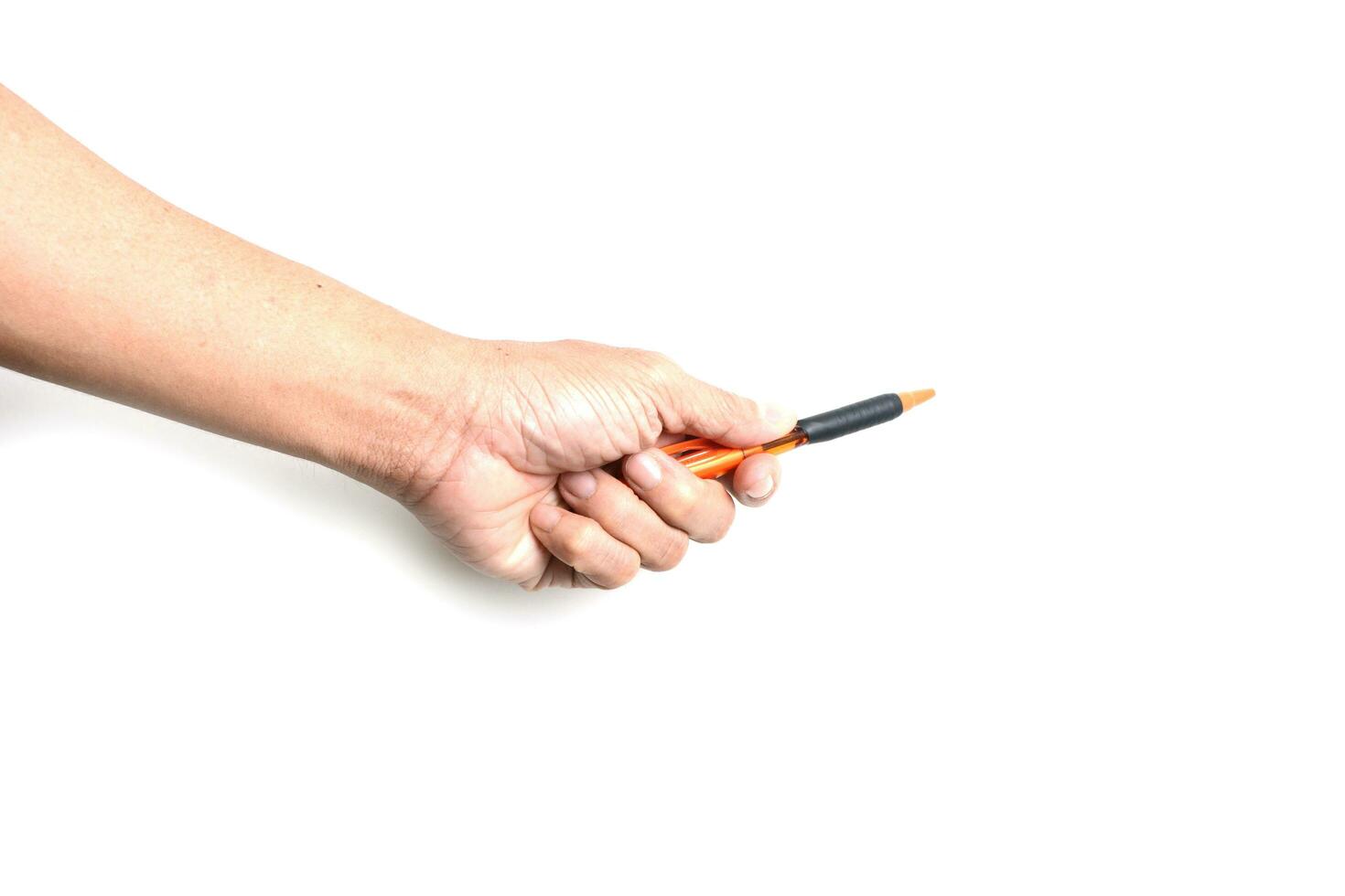 Hand holding a pen isolated on the white background. photo