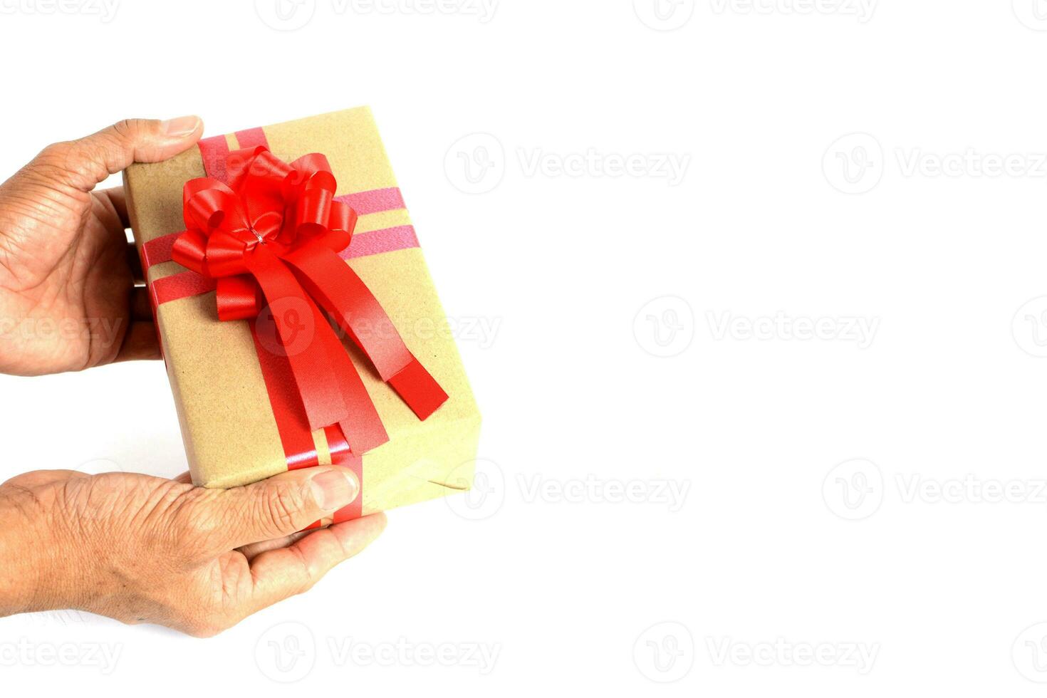 Gift Boxes in Craft Wrapping Paper with Red Ribbons isolated Stock
