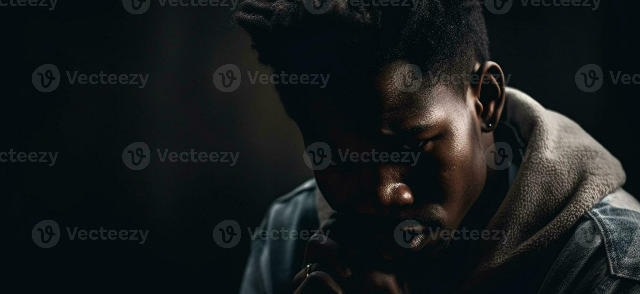 He's got his head down. black african american man depicting a sad depressive state, depression concept text copyspace banner background Ai Generated photo