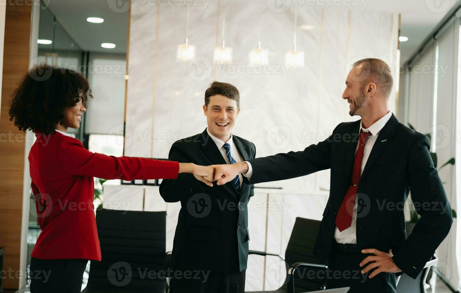 Hands of business people join together their hands together on unity concept photo