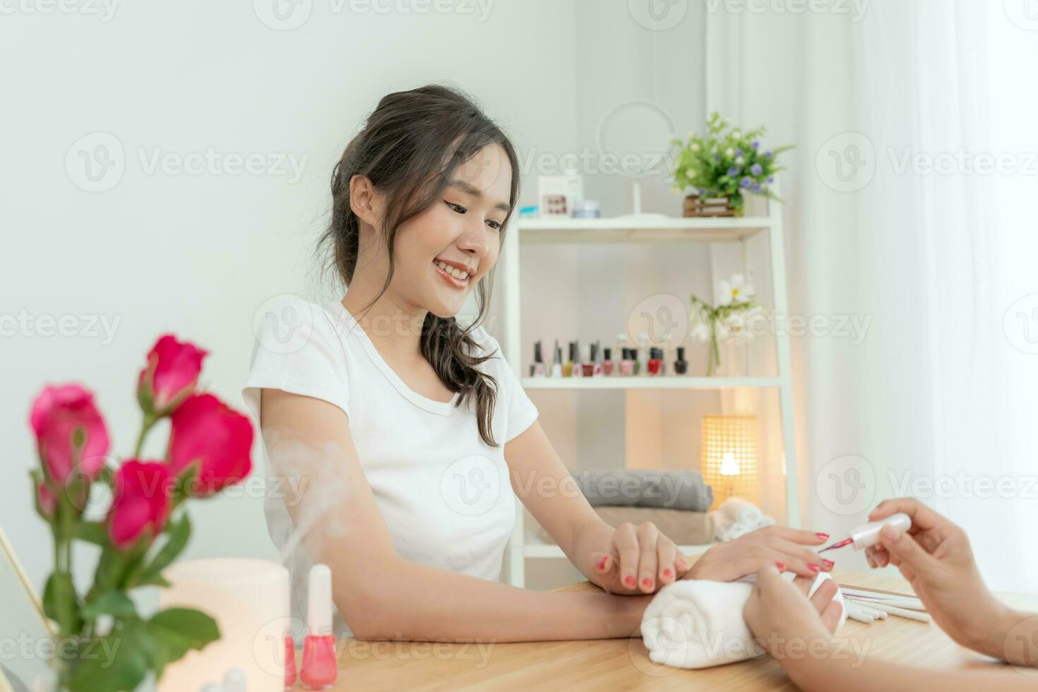 Woman receive care service by professional Beautician Manicure at spa centre. Nail beauty salon use nail file for Glazing treatment. manicurist make nail customer to beautiful. body care spa treatment photo