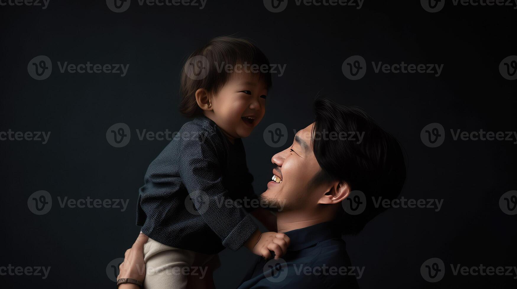 Father and son play together on father's day photo