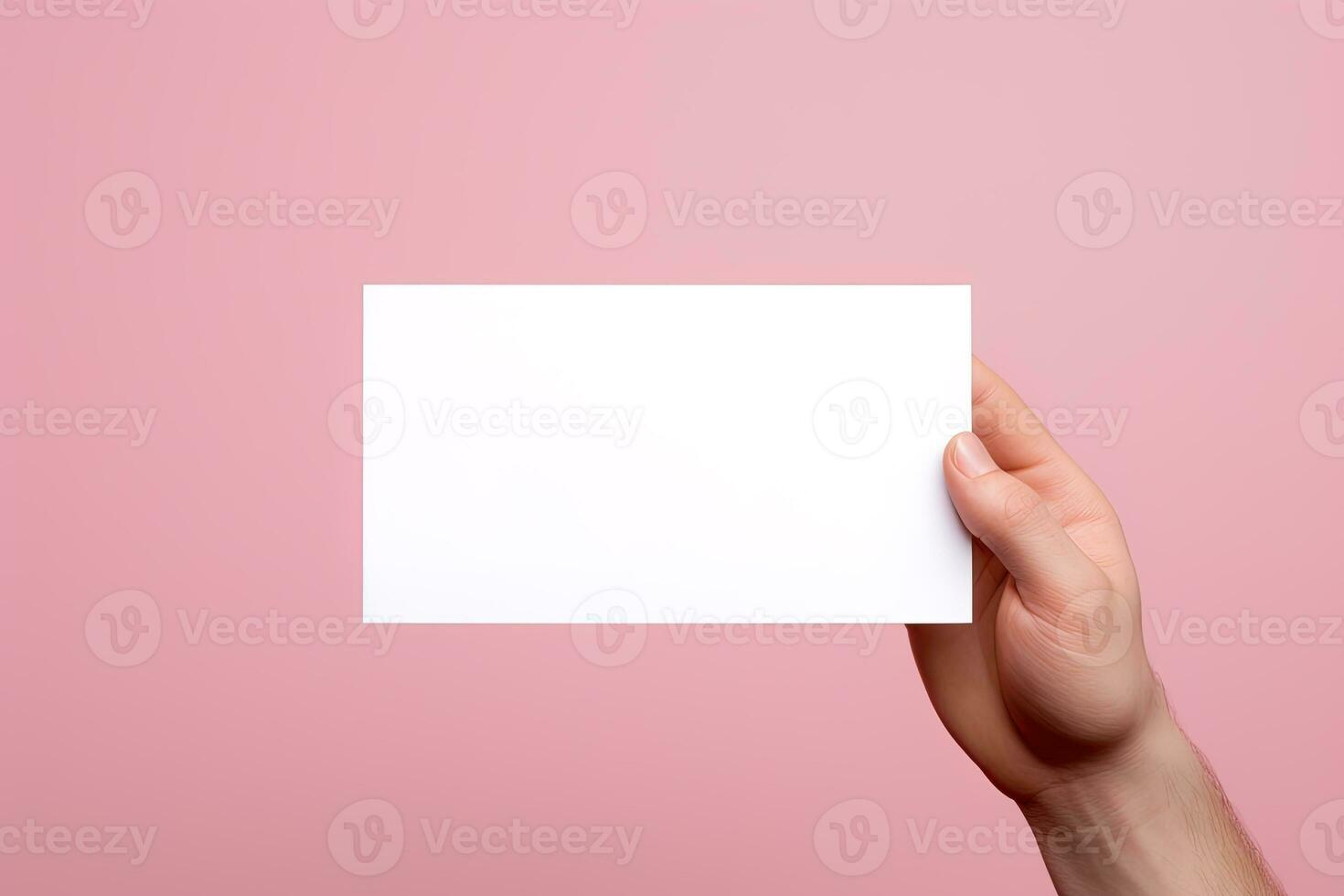 A human hand holding a blank sheet of white paper or card isolated on pink background. ai generated photo
