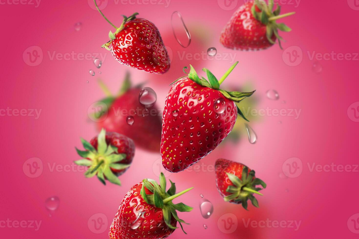 Composition of strawberries with water drops in the air. food levitation. concept photo