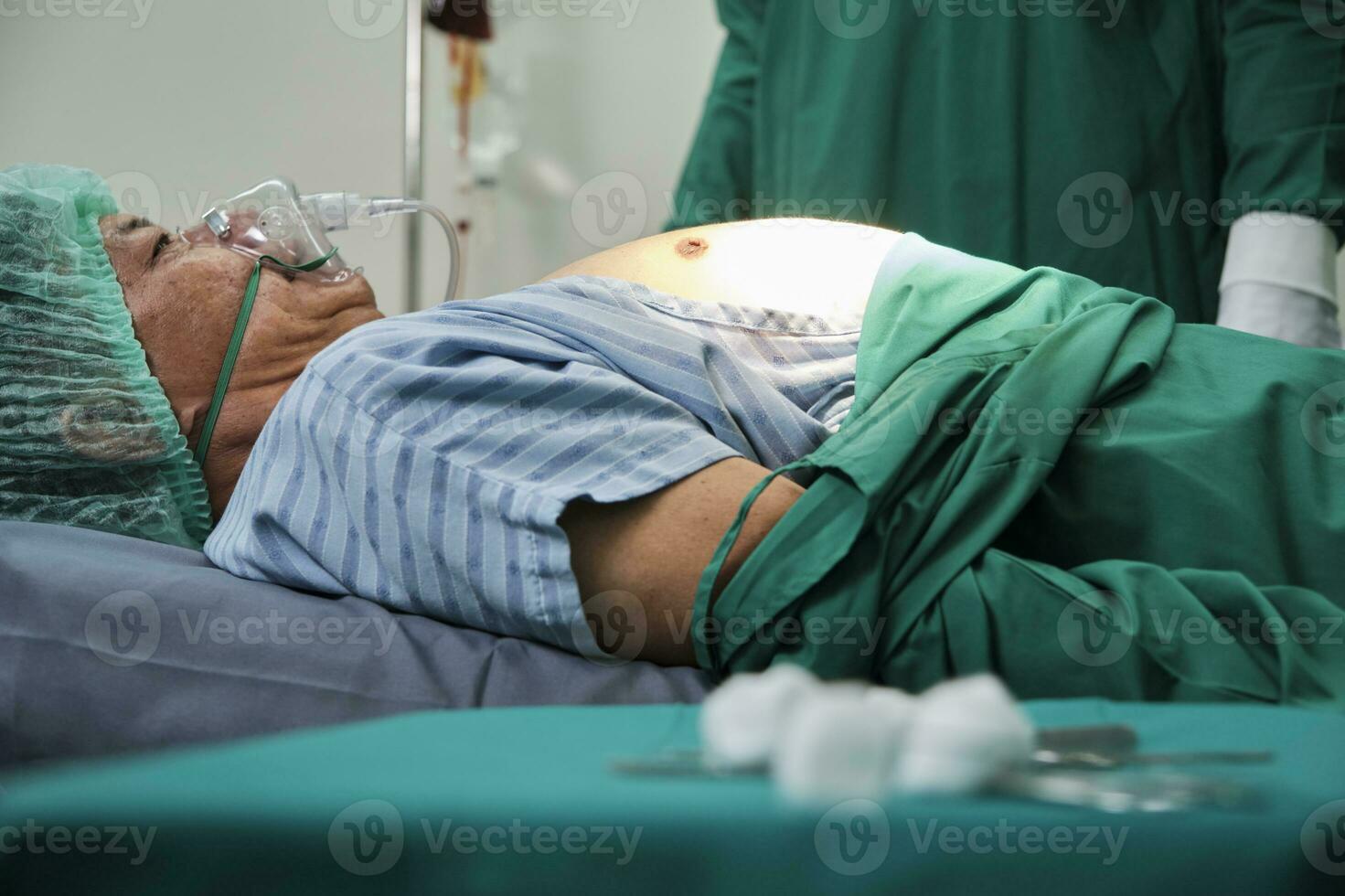 Male patient with ventilator safety life rescue after emergency surgery, CPR operating and medical from ICU surgeon doctors, health restore on critically bed care in hospital. photo