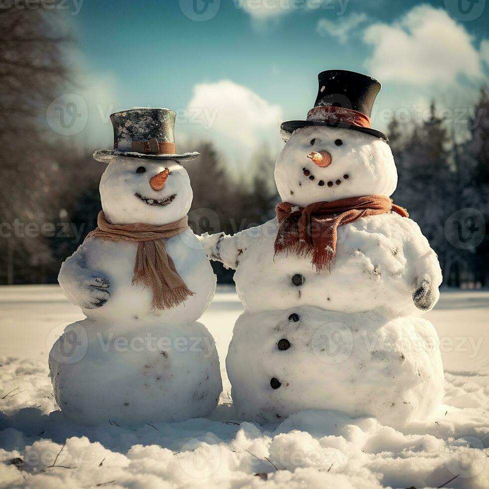 Two snowmen. Snowmen against the backdrop of a winter forest. photo