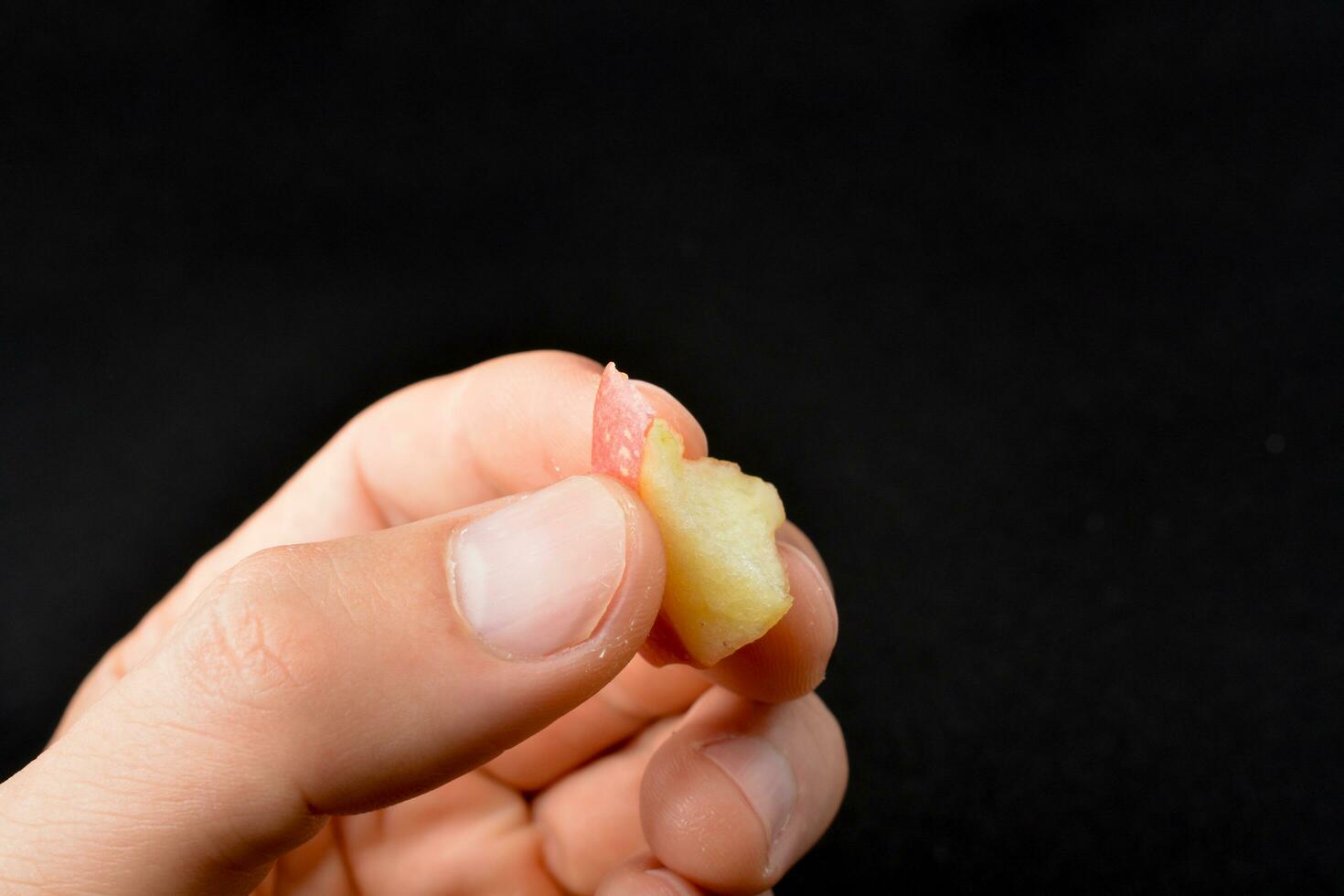 apple Black background with bite marks photo